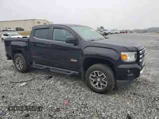 2015 GMC Canyon 4WD SLE with VIN 1GTG6BE37F1157166, listed as a Copart auction lot 71279914 with 114,484 mi miles and Salvage Title. Bid and sale history available at carsss.com. Image 4.