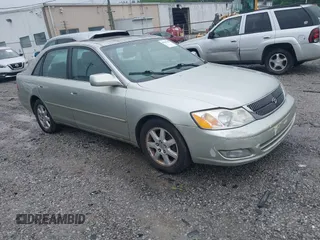 2001 Toyota Avalon XL z VIN 4T1BF28B91U144533, wystawiony jako IAAI lot #42247586 z przebiegiem 207 775 mil mil oraz . Historia ofert i sprzedaży dostępna na DreamBid. Obrazek 1.