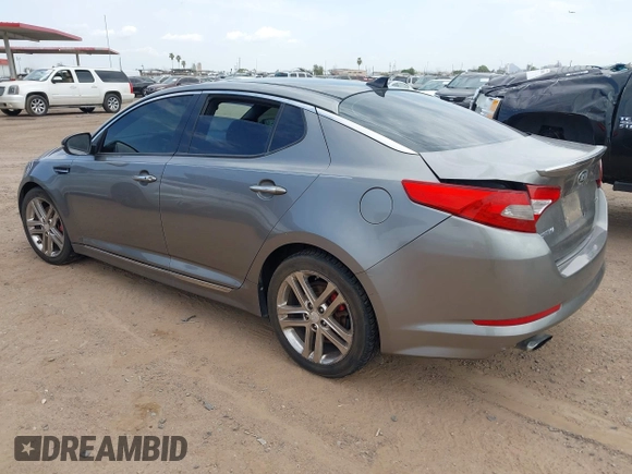 2013 Kia Optima SX with VIN 5XXGR4A6XDG151799, listed as a IAAI auction lot 42764035 with 189,983 mi miles and . Bid and sale history available at DreamBid. Image 3.