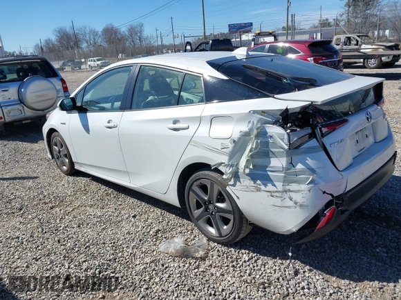 2021 Toyota Prius L Eco z VIN JTDKAMFUXM3142402, wystawiony jako IAAI lot #41665484 z przebiegiem 67 416 mil mil oraz . Historia ofert i sprzedaży dostępna na DreamBid. Obrazek 3.