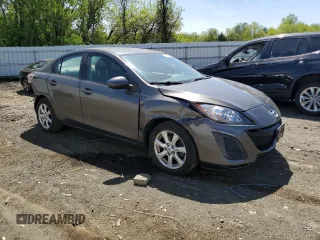 2011 Mazda 3 i Touring with VIN JM1BL1VG3B1371792, listed as a Copart auction lot 54933175 with 96,829 mi miles and Salvage Title. Bid and sale history available at DreamBid. Image 4.