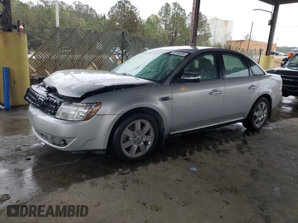 2009 Ford Taurus Limited with VIN 1FAHP25W09G100990, listed as a Copart auction lot 80745234 with 129,692 mi miles and Salvage Title. Bid and sale history available at carsss.com. Image 1.