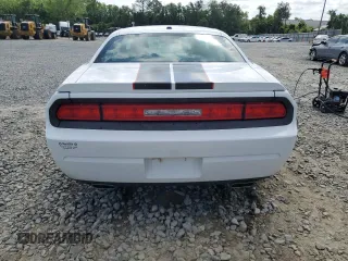 2011 Dodge Challenger z VIN 2B3CJ4DG0BH542773, wystawiony jako Copart lot #54646985 z przebiegiem 108 630 mil mil oraz Szkoda całkowita • Salvage title. Historia ofert i sprzedaży dostępna na DreamBid. Obrazek 6.