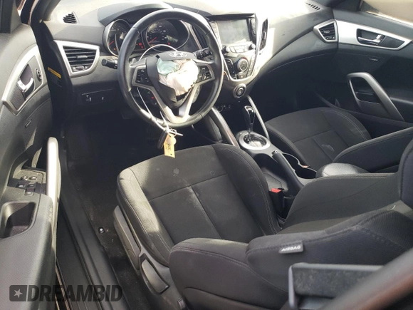 2017 Hyundai Veloster Value Edition with VIN KMHTC6AD5HU321105, listed as a Copart auction lot 50325705 with 100,397 mi miles and Salvage Title. Bid and sale history available at carsss.com. Image 8.