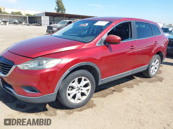2013 Mazda CX-9 Touring with VIN JM3TB2CV8D0410956, listed as a IAAI auction lot 42643918 with 187,045 mi miles and . Bid and sale history available at DreamBid. Image 2.