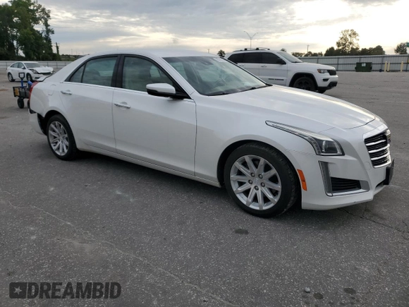 2015 Cadillac CTS Luxury RWD with VIN 1G6AR5SX1F0113369, listed as a Copart auction lot 68702294 with 56,895 mi miles and Salvage Title. Bid and sale history available at DreamBid. Image 4.