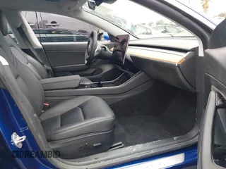 2020 Tesla Model 3 Standard Range Plus with VIN 5YJ3E1EAXLF644679, listed as a IAAI auction lot 41500595 with 53,726 mi miles and . Bid and sale history available at DreamBid. Image 5.