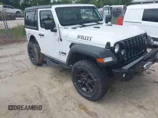 2021 Jeep Wrangler 80th Anniversary with VIN 1C4GJXAN4MW662472, listed as a IAAI auction lot 42452396 with 50,144 mi miles and . Bid and sale history available at DreamBid. Image 1.