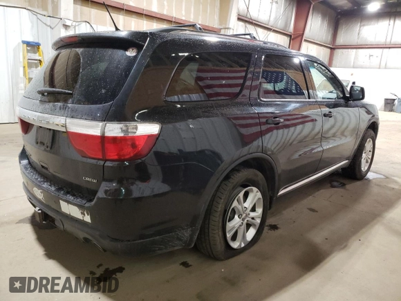 2012 Dodge Durango Crew with VIN 1C4SDJDT0CC323006, listed as a Copart auction lot 63631985 with 126,521 mi miles and Salvage title. Bid and sale history available at DreamBid. Image 3.