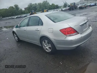 2006 Acura RL z VIN JH4KB16526C005279, wystawiony jako Copart lot #57917835 z przebiegiem 145 737 mil mil oraz Szkody całkowita. Historia ofert i sprzedaży dostępna na DreamBid. Obrazek 2.