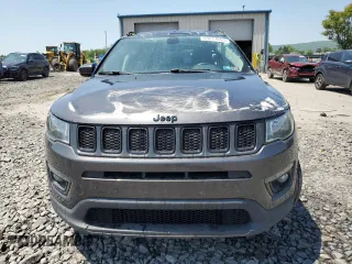 2019 Jeep Compass Altitude with VIN 3C4NJDBB0KT683557, listed as a Copart auction lot 59211055 with 102,648 mi miles and Salvage title. Bid and sale history available at DreamBid. Image 5.
