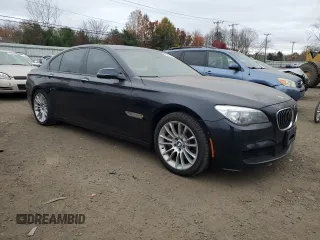 2014 BMW 7 Series 750i xDrive with VIN WBAYB6C52ED224729, listed as a Copart auction lot 77781224 with 0 mi miles and Salvage Title. Bid and sale history available at carsss.com. Image 4.