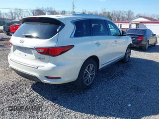 2016 Infiniti QX60 with VIN 5N1AL0MM9GC514586, listed as a IAAI auction lot 41861058 with 151,741 mi miles. Bid and sale history available at carsss.com. Image 4.