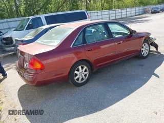 2001 Toyota Avalon XL z VIN 4T1BF28B41U178086, wystawiony jako IAAI lot #42253446 z przebiegiem 249 390 mil mil oraz . Historia ofert i sprzedaży dostępna na DreamBid. Obrazek 4.