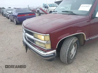 1999 Chevrolet Suburban with VIN 3GNEC16R5XG114890, listed as a IAAI auction lot 41345029 with 274,687 mi miles. Bid and sale history available at carsss.com. Image 13.