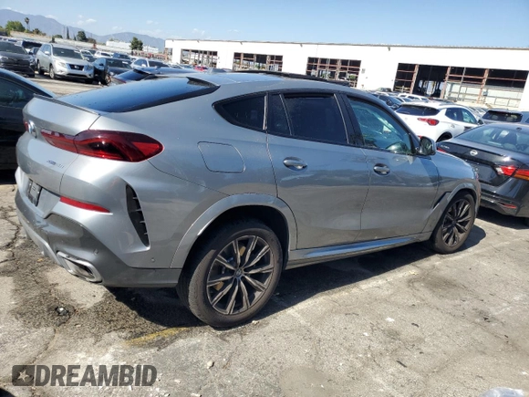 2025 BMW X6 xDrive40i z VIN 5UX33EX03S9X00132, wystawiony jako Copart lot #56373235 z przebiegiem Nie podano mil oraz Tytuł czysty. Historia ofert i sprzedaży dostępna na DreamBid. Obrazek 3.