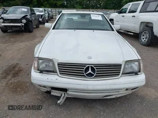 1997 Mercedes-Benz SL 500 z VIN WDBFA63F0VF146394, wystawiony jako IAAI lot #42308697 z przebiegiem 106 935 mil mil oraz . Historia ofert i sprzedaży dostępna na DreamBid. Obrazek 6.