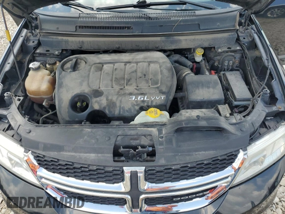 2013 Dodge Journey SXT with VIN 3C4PDDBG0DT532765, listed as a Copart auction lot 61481335 with 193,066 mi miles and Salvage title. Bid and sale history available at DreamBid. Image 12.