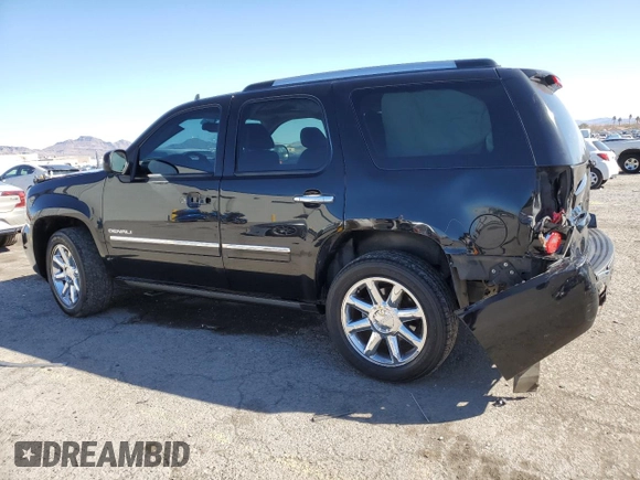 2014 GMC Yukon Denali with VIN 1GKS2EEF3ER126843, listed as a Copart auction lot 46298535 with 72,297 mi miles and Salvage Title. Bid and sale history available at carsss.com. Image 2.
