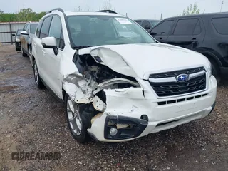 2017 Subaru Forester Touring with VIN JF2SJAWCXHH501702, listed as a IAAI auction lot 42080564 with 188,392 mi miles and . Bid and sale history available at DreamBid. Image 1.