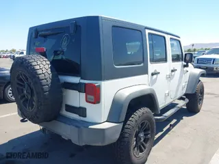2010 Jeep Wrangler Unlimited Sport with VIN 1J4BA3H1XAL102159, listed as a IAAI auction lot 40190164 with 262,194 mi miles. Bid and sale history available at carsss.com. Image 4.