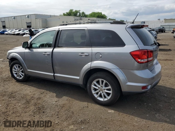 2017 Dodge Journey SXT with VIN 3C4PDDBG4HT608395, listed as a Copart auction lot 60811885 with 145,503 mi miles and Salvage title. Bid and sale history available at DreamBid. Image 2.