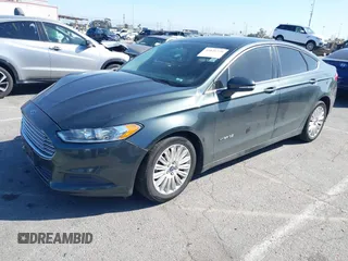 2015 Ford Fusion SE Hybrid with VIN 3FA6P0LU4FR306928, listed as a IAAI auction lot 41826720 with 83,983 mi miles. Bid and sale history available at carsss.com. Image 2.