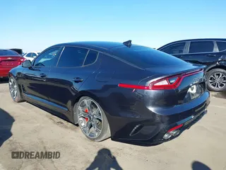 2019 Kia Stinger GT with VIN KNAE35LC3K6059198, listed as a IAAI auction lot 41599686 with 82,886 mi miles. Bid and sale history available at carsss.com. Image 3.
