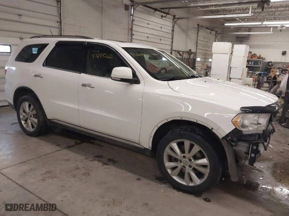 2013 Dodge Durango Crew with VIN 1C4SDJDT1DC540680, listed as a IAAI auction lot 41649262 with 106,016 mi miles. Bid and sale history available at carsss.com. Image 1.