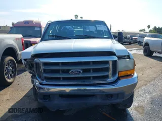 2000 Ford Super Duty F-250 XL with VIN 1FTNW21F5YEB57752, listed as a IAAI auction lot 40702428 with 323,191 mi miles. Bid and sale history available at carsss.com. Image 13.