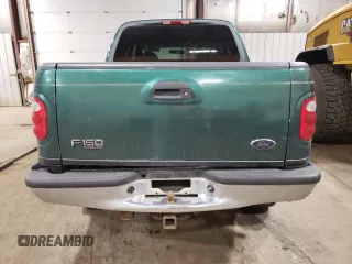 2001 Ford F-150 XLT with VIN 1FTRW08W41KD98737, listed as a Copart auction lot 64695065 with 179,158 mi miles and Clean title. Bid and sale history available at DreamBid. Image 6.