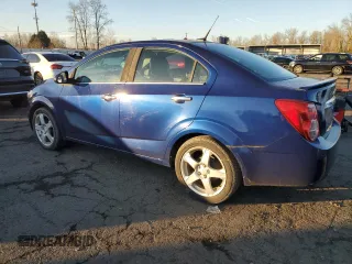 2014 Chevrolet Sonic LTZ with VIN 1G1JE5SB8E4219086, listed as a Copart auction lot 88990405 with 96,177 mi miles and Salvage Title. Bid and sale history available at carsss.com. Image 2.