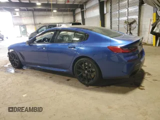 2024 BMW 8 Series M850i z VIN WBAGV8C07RCP90030, wystawiony jako Copart lot #53668245 z przebiegiem Nie podano mil oraz Szkody całkowita. Historia ofert i sprzedaży dostępna na DreamBid. Obrazek 2.