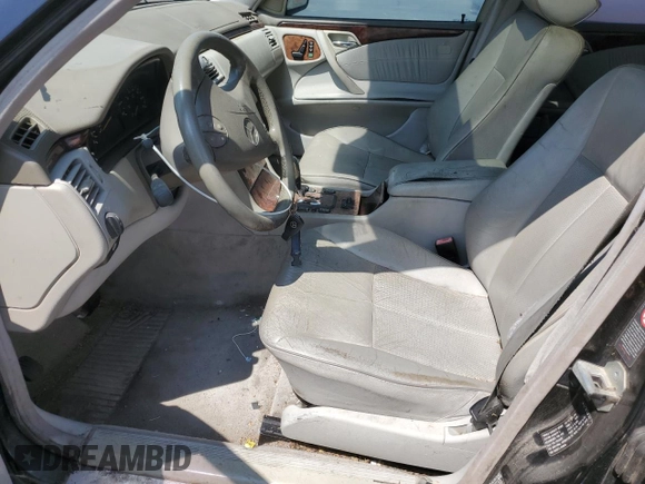 2001 Mercedes-Benz E-Class with VIN WDBJF65J01B225871, listed as a Copart auction lot 66136994 with 2,139,454 mi miles and Clean Title. Bid and sale history available at carsss.com. Image 7.
