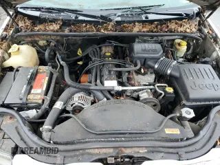 2004 Jeep Grand Cherokee Laredo z VIN 1J4GW48S74C288625, wystawiony jako Copart lot #61290805 z przebiegiem 194 615 mil mil oraz Czysty tytuł • Clean title. Historia ofert i sprzedaży dostępna na DreamBid. Obrazek 12.