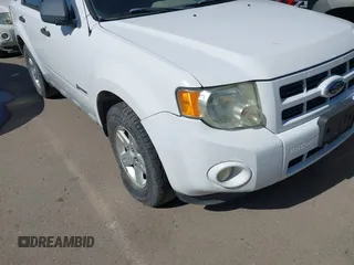 2009 Ford Escape Hybrid with VIN 1FMCU59369KC02897, listed as a IAAI auction lot 41841414 with 246,324 mi miles and . Bid and sale history available at DreamBid. Image 6.