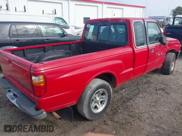 2003 Mazda B-Series 2WD Truck SE with VIN 4F4YR46V33TM13768, listed as a IAAI auction lot 41351910 with 212,641 mi miles. Bid and sale history available at carsss.com. Image 4.