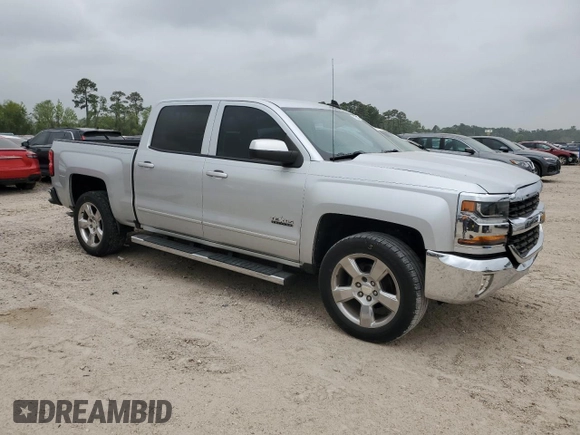 2017 Chevrolet Silverado 1500 LT with VIN 3GCPCREC4HG119318, listed as a Copart auction lot 51225265 with 123,209 mi miles and Salvage Title. Bid and sale history available at DreamBid. Image 4.