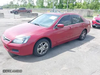 2007 Honda Accord Sdn EX-L with VIN 1HGCM56817A019819, listed as a IAAI auction lot 42102151 with 240,662 mi miles. Bid and sale history available at carsss.com. Image 2.