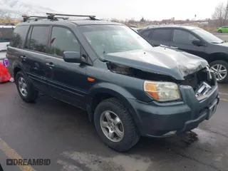 2006 Honda Pilot EX-L with VIN 2HKYF18526H563831, listed as a IAAI auction lot 41255427 with 237,074 mi miles. Bid and sale history available at carsss.com. Image 1.