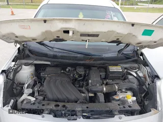 2014 Nissan Versa SV with VIN 3N1CN7AP9EL809772, listed as a IAAI auction lot 42199651 with 163,102 mi miles. Bid and sale history available at carsss.com. Image 10.