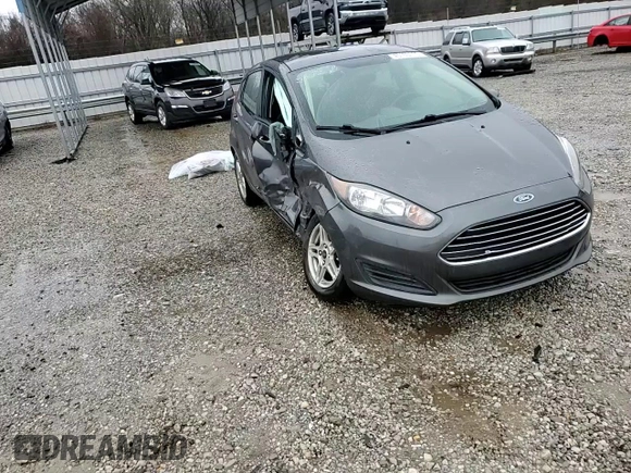 2019 Ford Fiesta SE z VIN 3FADP4EJ8KM127915, wystawiony jako Copart lot #45153775 z przebiegiem 99 494 mil mil oraz Szkoda całkowita • Salvage title. Historia ofert i sprzedaży dostępna na DreamBid. Obrazek 12.