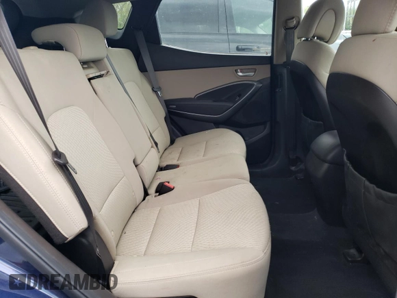2017 Hyundai Santa Fe 2.4L z VIN 5XYZUDLB5HG483135, wystawiony jako Copart lot #55426735 z przebiegiem 93 470 mil mil oraz Szkoda całkowita • Salvage title. Historia ofert i sprzedaży dostępna na DreamBid. Obrazek 11.