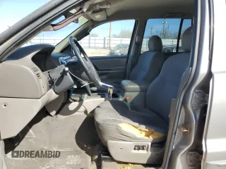 2002 Jeep Grand Cherokee with VIN 1J4GX38S82C178199, listed as a Copart auction lot 48996515 with 299,780 mi miles and Salvage title. Bid and sale history available at DreamBid. Image 7.