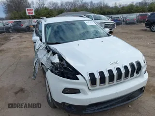 2015 Jeep Cherokee Latitude z VIN 1C4PJMCS9FW625521, wystawiony jako IAAI lot #41894602 z przebiegiem 112 865 mil mil oraz . Historia ofert i sprzedaży dostępna na DreamBid. Obrazek 1.