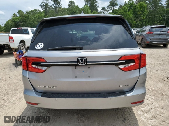 2022 Honda Odyssey Touring с VIN 5FNRL6H82NB009321, выставлен на аукционе Copart как лот 59058535 с пробегом 88 073 миль миль и Списание • Salvage title. История ставок и продаж доступна на DreamBid. Изображение 6.