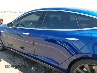 2016 Tesla Model S 70 kWh Battery with VIN 5YJSA1E10GF126433, listed as a IAAI auction lot 42169558 with 120,182 mi miles and . Bid and sale history available at carsss.com. Image 14.