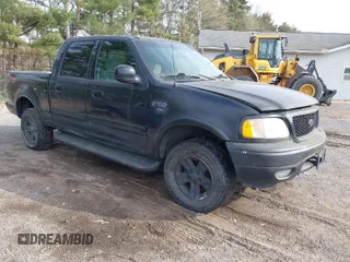 2002 Ford F-150 XLT with VIN 1FTRW08L12KB91777, listed as a IAAI auction lot 42007013 with 192,758 mi miles. Bid and sale history available at carsss.com. Image 1.