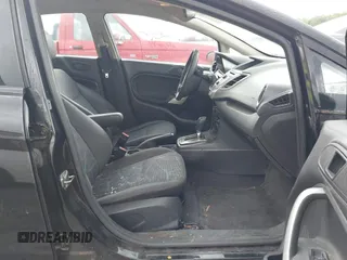 2013 Ford Fiesta SE z VIN 3FADP4BJ6DM218088, wystawiony jako IAAI lot #42319209 z przebiegiem 109 208 mil mil oraz . Historia ofert i sprzedaży dostępna na DreamBid. Obrazek 5.