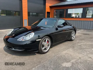 1999 Porsche 911 z VIN WP0CA2990XS651134, wystawiony jako Copart lot #59694365 z przebiegiem 80 805 mil mil oraz Czysty tytuł • Clean title. Historia ofert i sprzedaży dostępna na DreamBid. Obrazek 2.